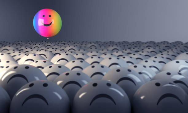 istock Standing Out From The Crowd With Smiling Rainbow Sphere 962520060