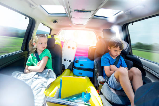 istock Siblings arguing in the car during a long car journey 962523862
