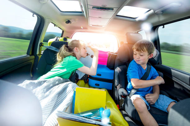 istock Siblings arguing in the car during a long car journey 962523898