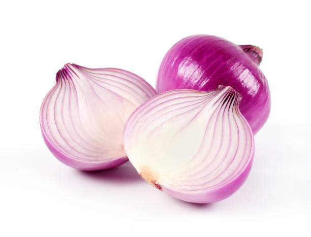 istock Red sliced onion isolated on white background 962524948