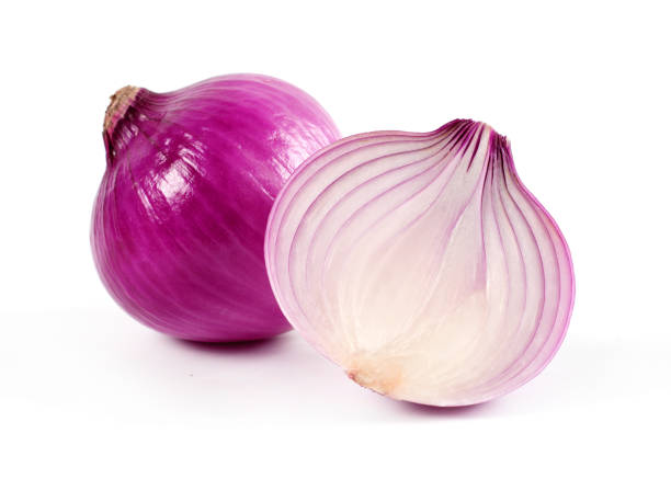 istock Red sliced onion isolated on white background 962525218