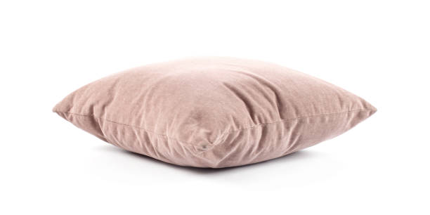 istock close up of a Meat Pink pillow on white background 962532516