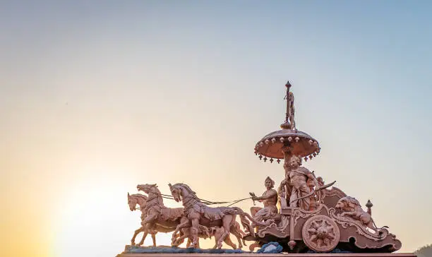 Photo of A statue of the Hindu god Krishna and his devotee Arjuna at Parmarth Niketan in Rishikesh, North India