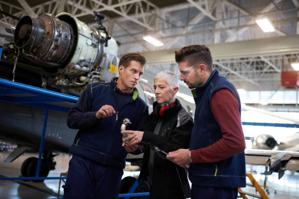 Aircraft mechanics in the hangar