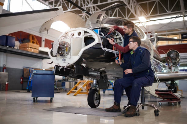 istock Aircraft mechanics in the hangar 962539092