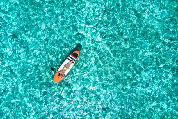 istock Woman on the paddleboard 962539516
