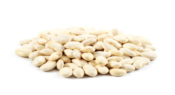 istock Heap of white beans isolated on white background 962553434