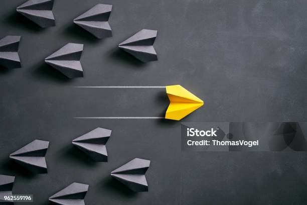 Paper Airplane On Blackboard Origami Yellow Concept Stock Photo - Download Image Now