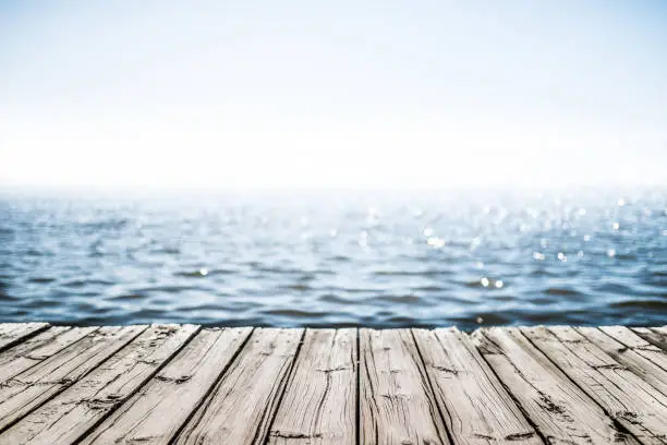 Photo of wooden deck by the sea