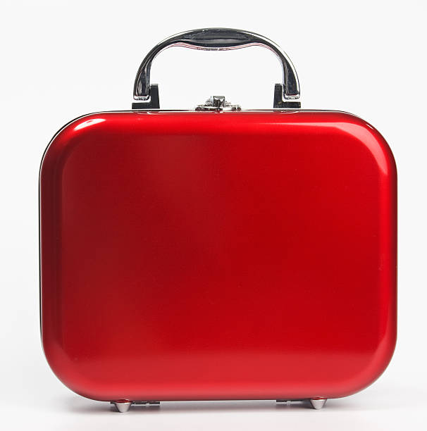 Red small suitcase stock photo