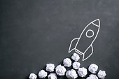 Space rocket on blackboard - Crumpled paper Idea Creativity