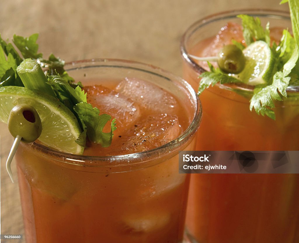 Close up, Bloody Marys Bloody Marys with celery, olive, lime and seasonings, close shot. Alcohol - Drink Stock Photo