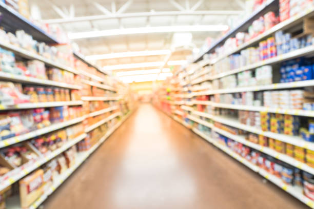 istock Blurred bulk side soup, beans, canned vegetables in grocery store 962568386