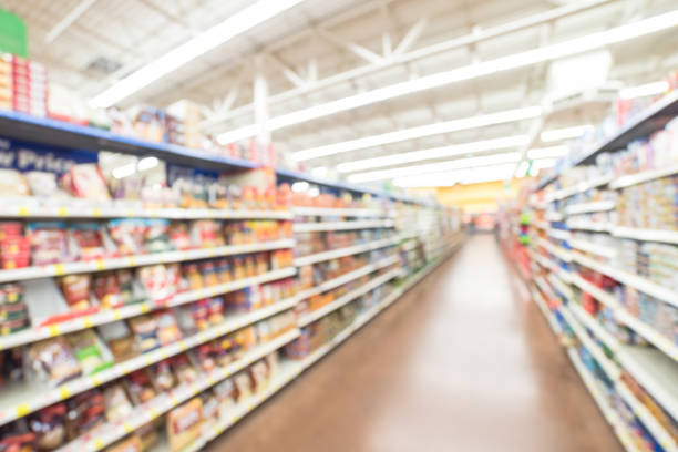 istock Blurred bulk side soup, beans, canned vegetables in grocery store 962568516