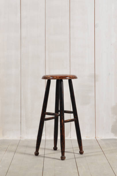 istock Wooden Stool on Wood Background 962569356