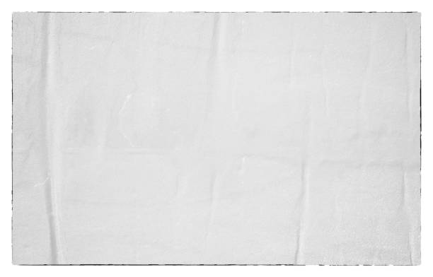 istock Blank old ripped torn paper crumpled creased posters grunge textures backdrop backgrounds 962569828