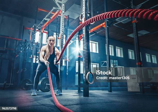 Woman With Battle Rope Battle Ropes Exercise In The Fitness Gym Stock Photo - Download Image Now