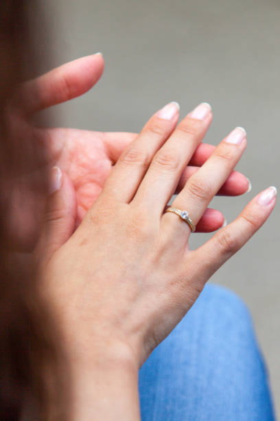 istock Woman wearing an engagement ring 962575544