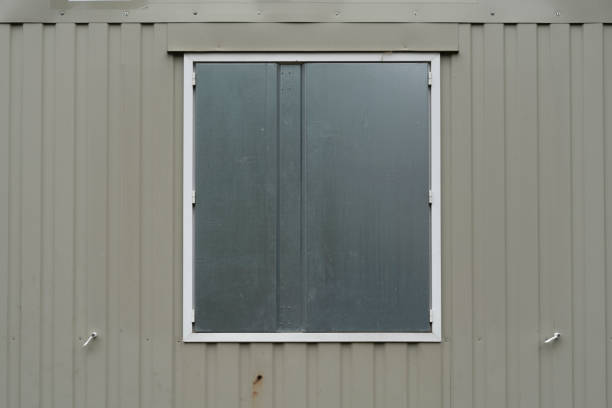 istock Closed metal window in the building of construction site 962578256