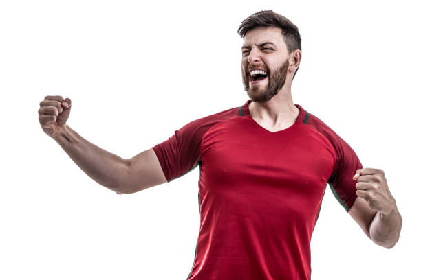 istock Fan / Sport Player on red uniform celebrating on white background 962580846