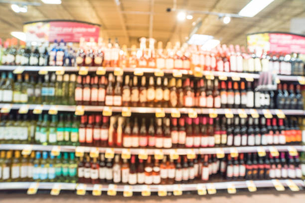 istock Abstract blurred wine shelves with price tags at store in USA 962584856