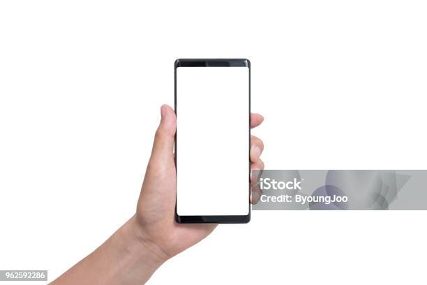 Hand Holding Black Smartphone Isolated On White Clipping Path Inside Stock Photo - Download Image Now