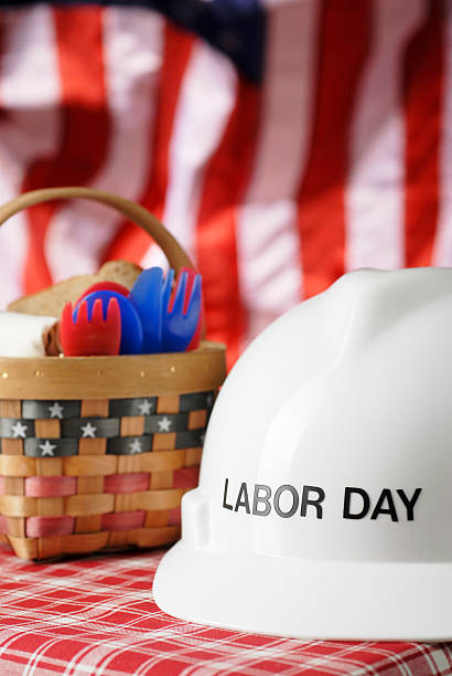 Labor Day picnic basket with a stars and stripes background stock photo