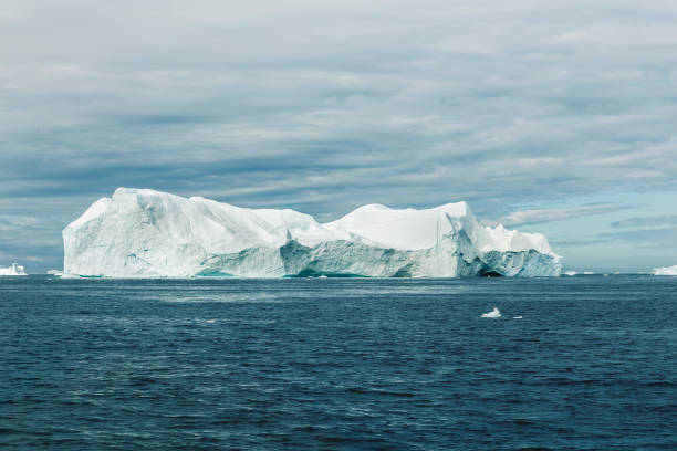 istock Big iceberg floats in Diskobay in Greenland 962603638