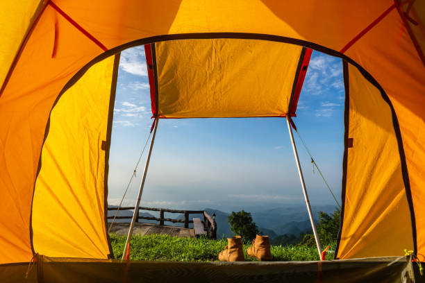 istock Camping tents on the mountain. 962604084