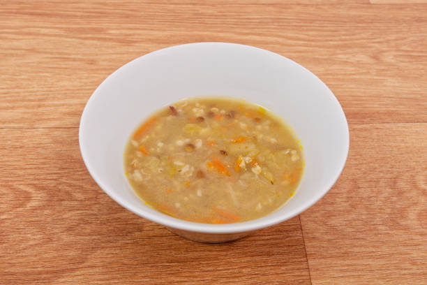 istock Soup with pasta and vegetables on a table 962609690