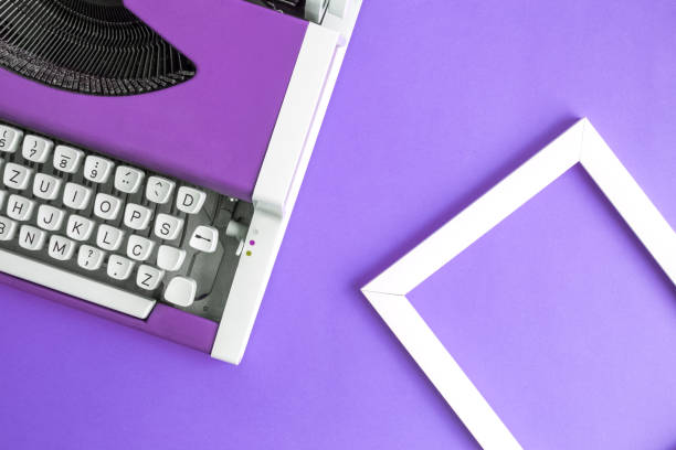 istock Flat lay of typing machine and blank photo frame. 962611230