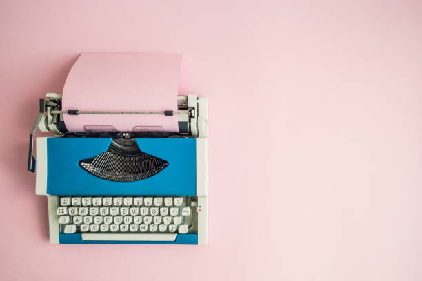 istock Flat lay of retro hipster typewriter pastel abstract concept. 962611582