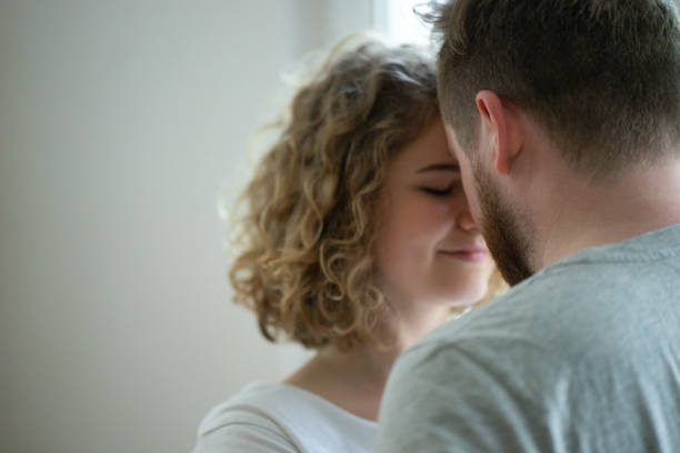 istock Young couple enjoying a relaxing and romantic moment 962611700