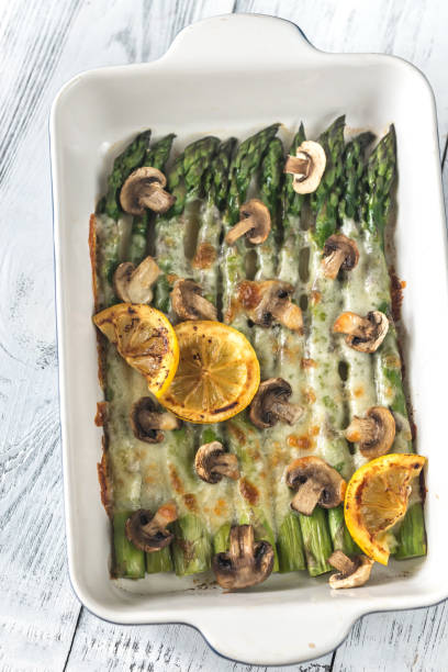 istock Baked asparagus with mozzarella and lemon 962615718