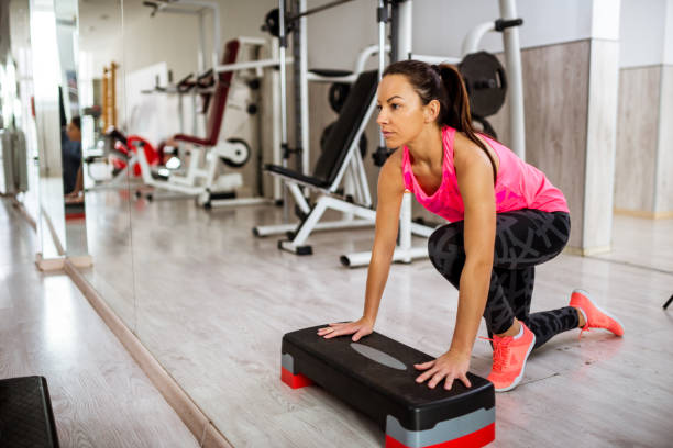istock Beautiful woman in gym 962615910
