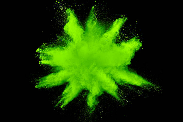 istock abstract green dust explosion on  black background.abstract green powder splattered on black background.Freeze motion of green powder exploding. 962618920
