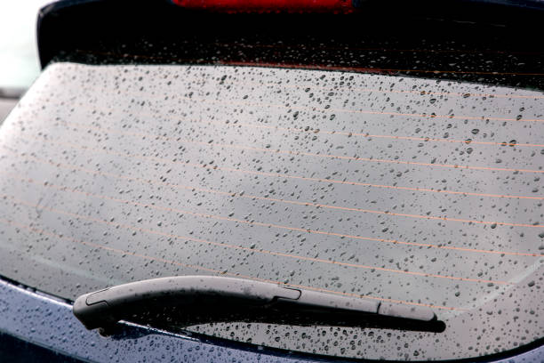 istock The rear window of the car with droplets. 962620908