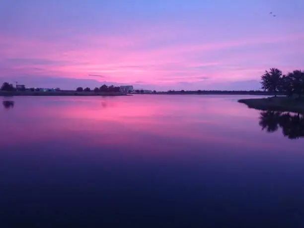 sunset across water in Orlando, florida