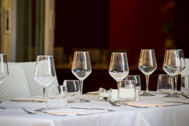 istock close up of goblet glasses in a row on table 962625636