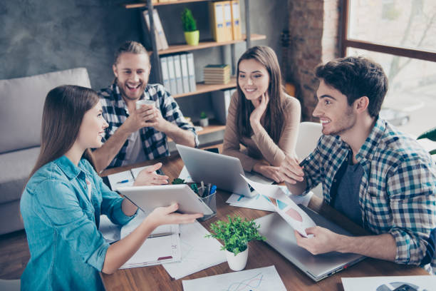 istock Occupation partnership leadership coworking concept. Cheerful excited smart confident clever curious workers are discussing planning listening to speaker 962625734