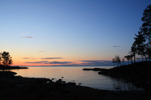 istock Trees reflected in the water. Northern landscape. 962632434