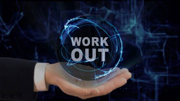 istock Painted hand shows concept hologram Work out on his hand 962633160