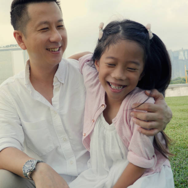 istock Dad and daughter enjoy park together 962633736