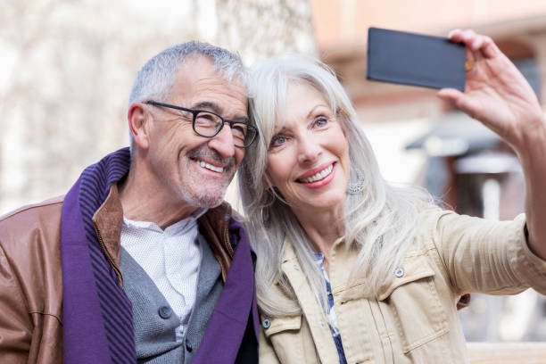 istock Senior couple take selfie on vacation 962641840