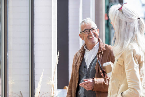 istock Senior business people walk to work 962641916
