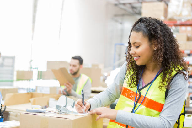 istock Cheerful young distribution warehouse employee 962642366