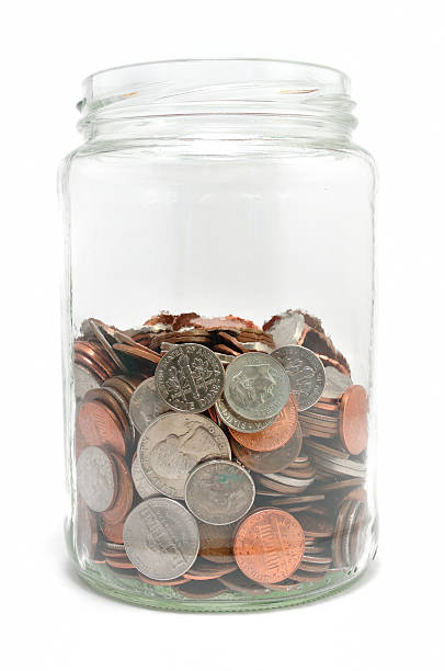 istock Jar Half Full of Coins 96264757
