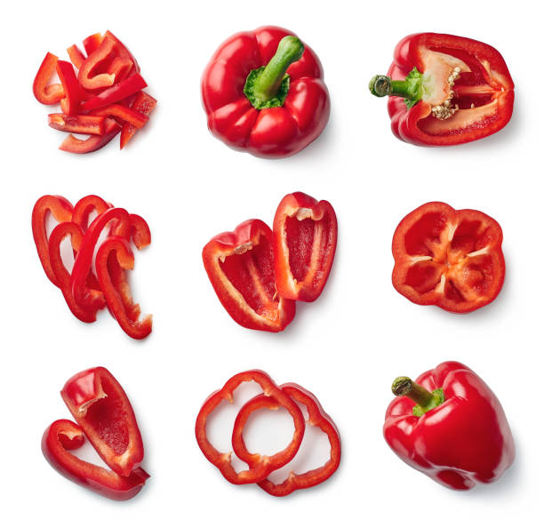 Set of fresh whole and sliced sweet pepper Set of fresh whole and sliced sweet red pepper isolated on white background. Top view halved photos stock pictures, royalty-free photos & images