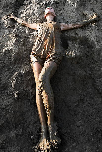 istock Young woman standing in the mud 96264893