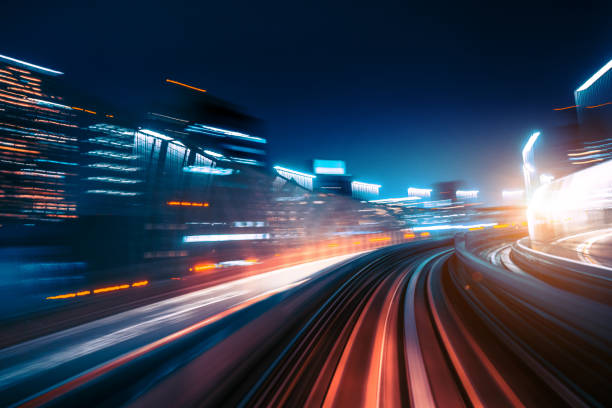 istock Motion Speed Light Tail with Night City Background 962650288